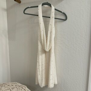 Oh Polly brand.. white beaded mini dress, low neckline, open back. US size 2.